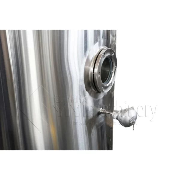 Heated mixing tank with sight glass jacket