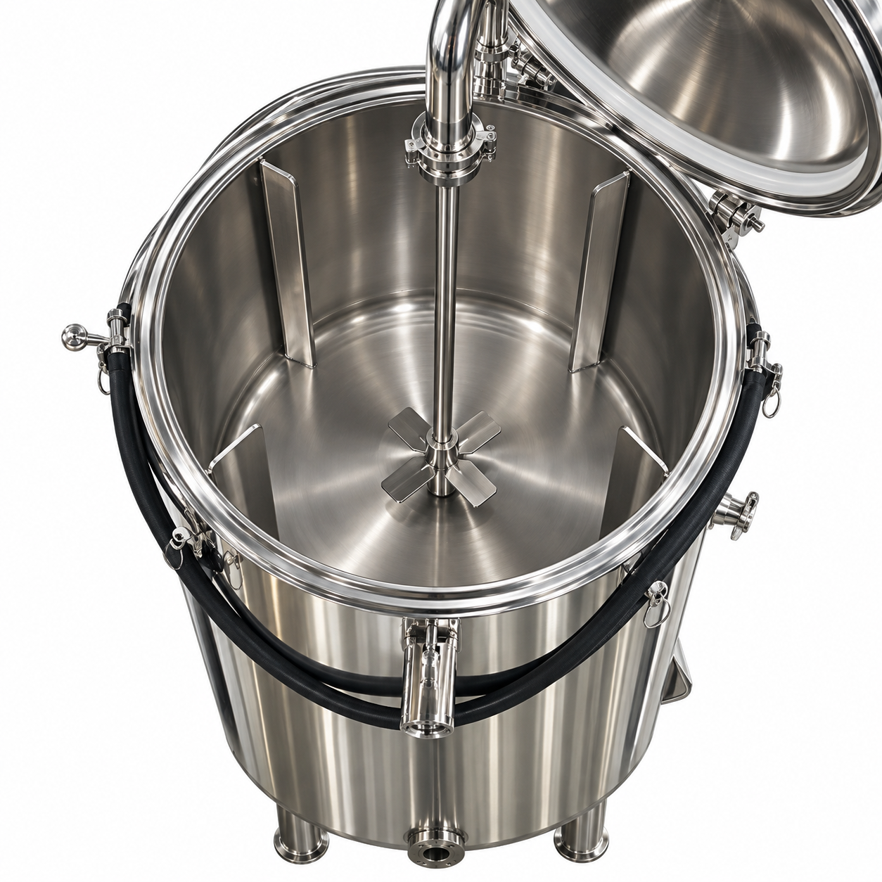 Top view inside a stainless steel fermenter showing four vertical wall baffles