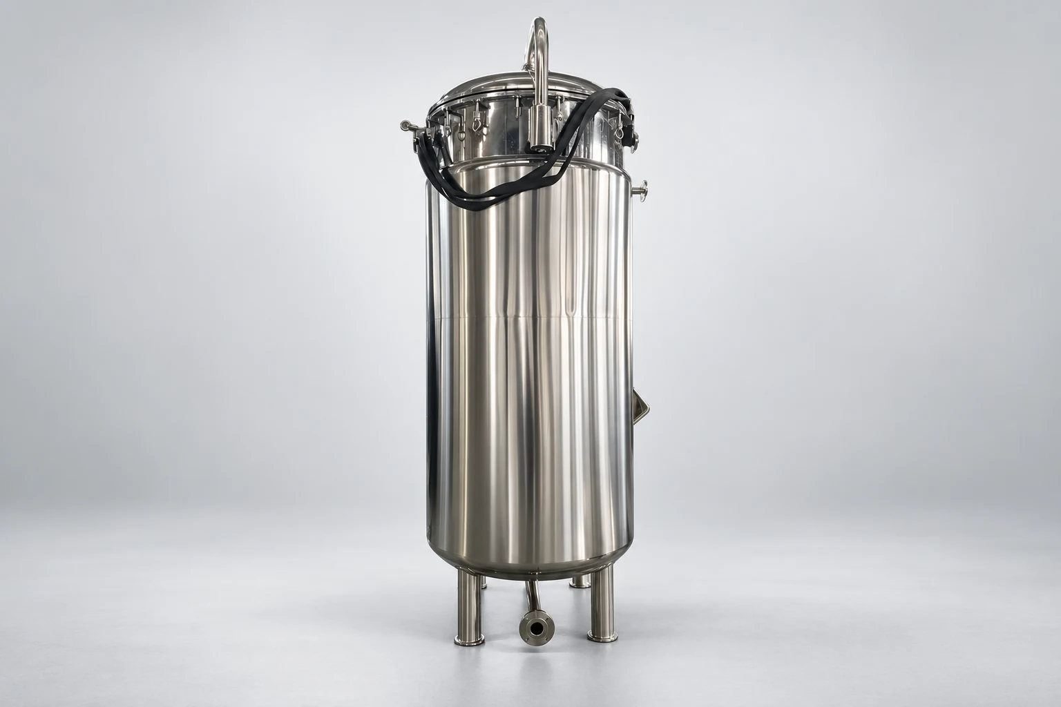 Vertical stainless steel fermenter on a neutral background