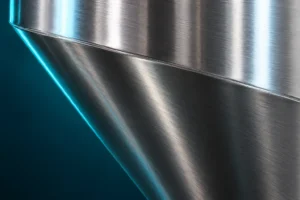 Close view of the stainless cylinder-to-cone transition on a process silo