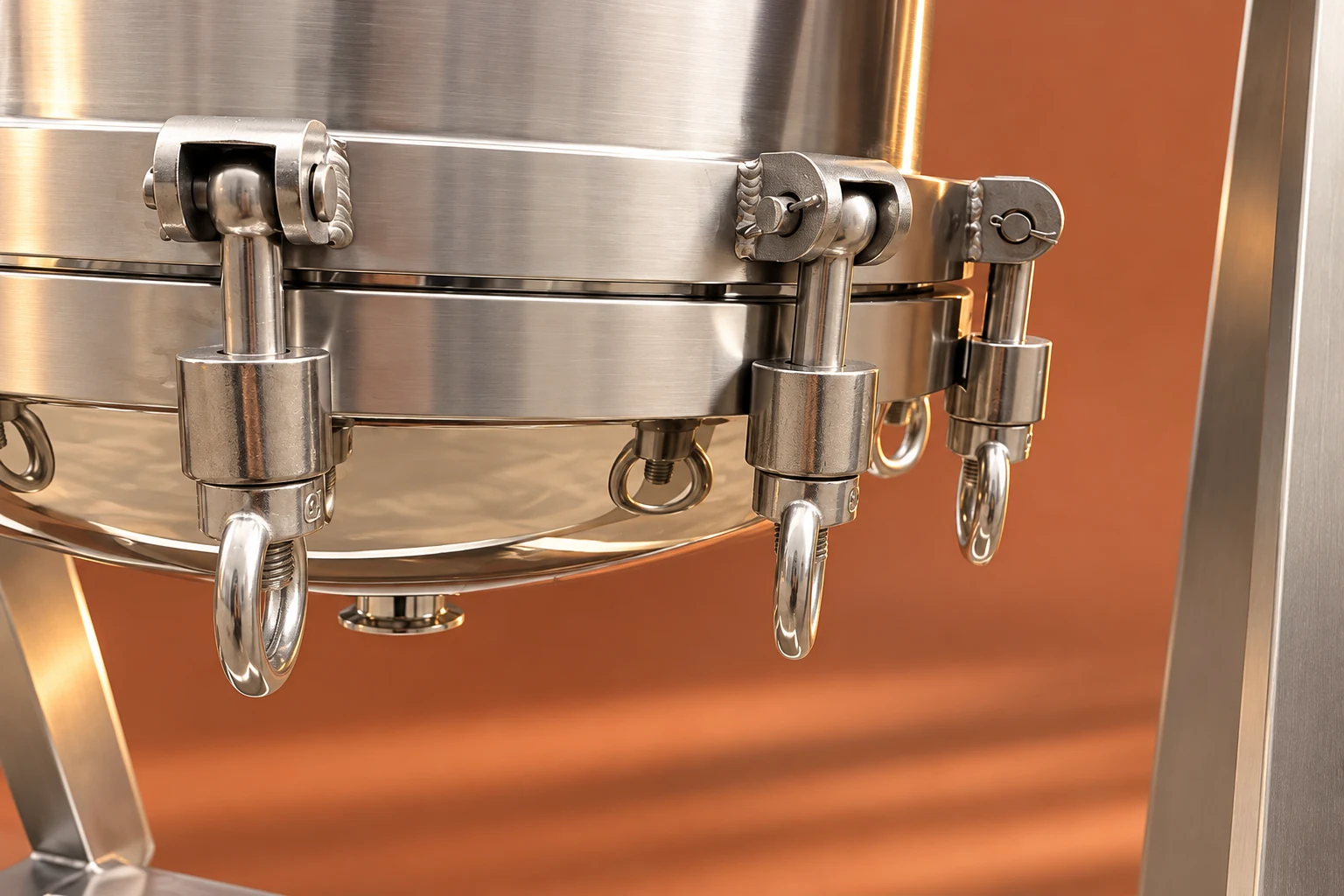 Diagonal close view of lower filter closure clamps